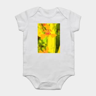 Yellow lily blossom on yellow background Baby Bodysuit